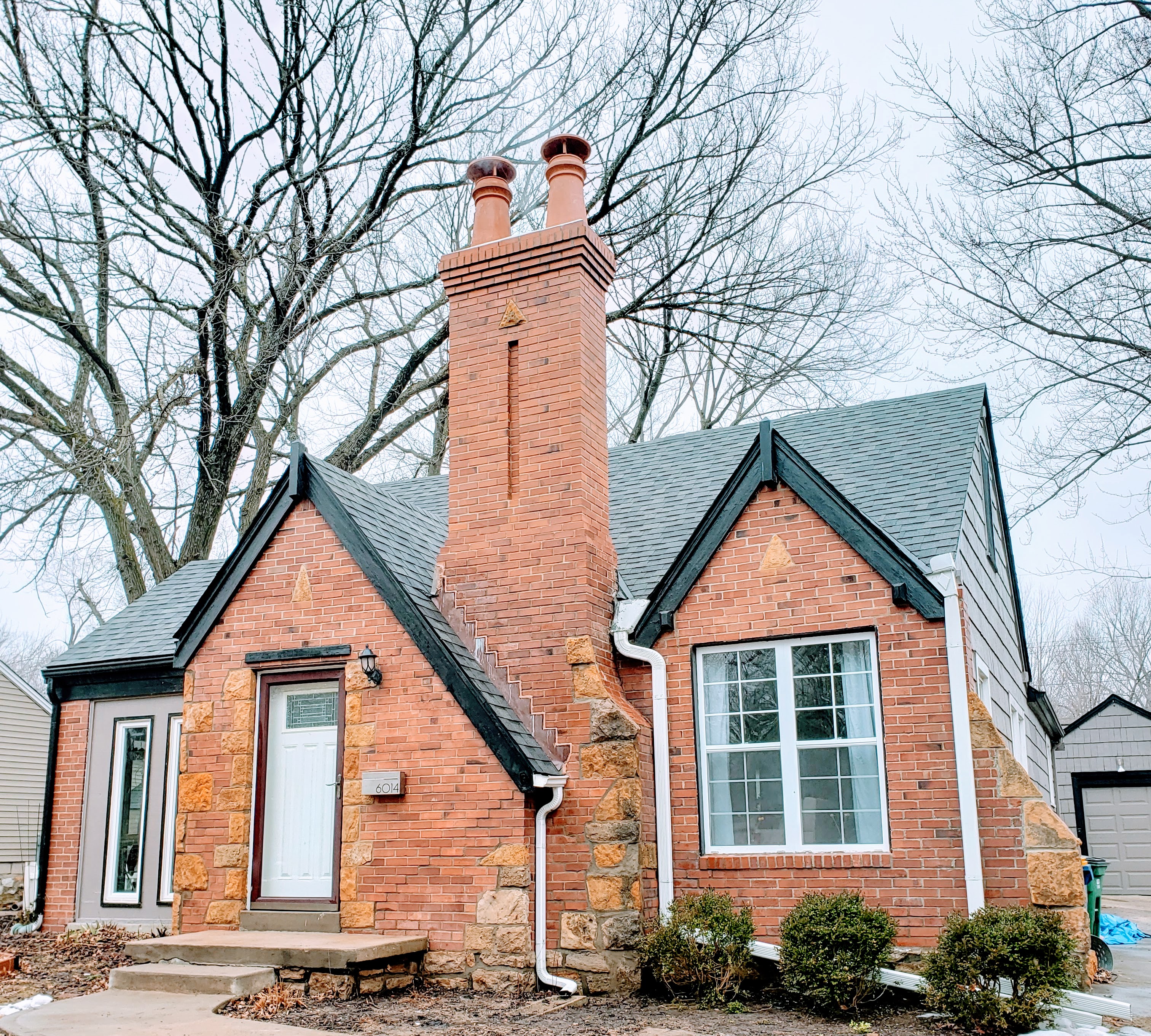 Sealed and coated masonry wall